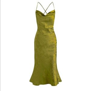 Elegant green silk-like dress with open back